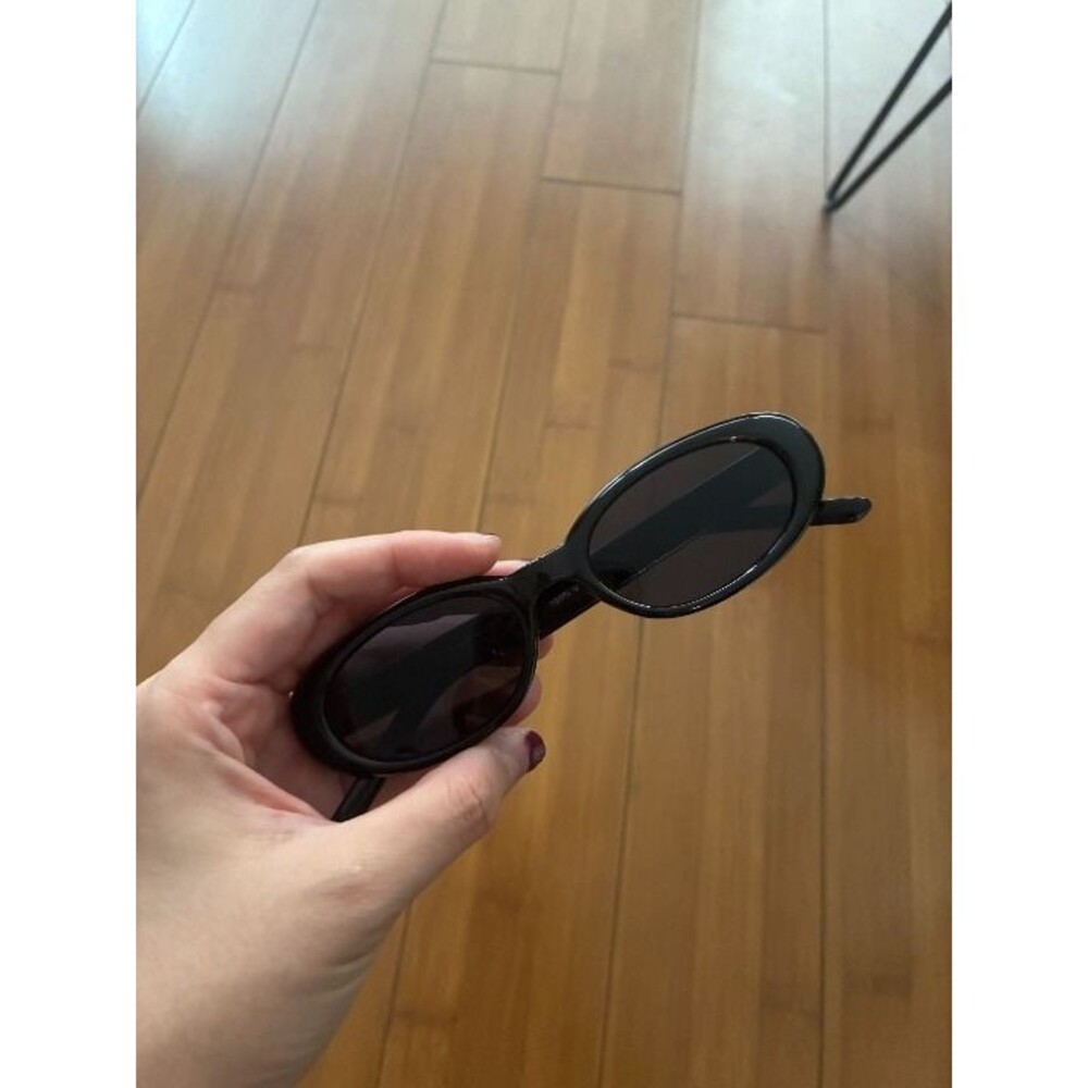 Black oval sunglasses, women's fashion accessory